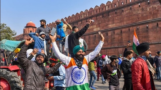 Farmers near Red Fort in New Delhi, Tuesday, January 26. (PTI) Farmers near Red Fort in New Delhi, Tuesday, January 26. (PTI)