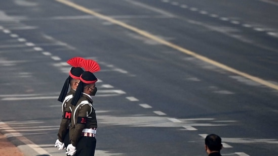 Military personnel stand guard along the Rajpath(AFP) Military personnel stand guard along the Rajpath(AFP)