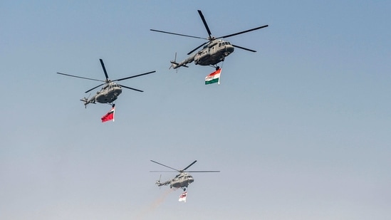 Air Force helicopters flypast over Rajpath during the Republic Day parade in New Delhi on January 26, 2021. (Photo by Jewel SAMAD / AFP)(AFP) Air Force helicopters flypast over Rajpath during the Republic Day parade in New Delhi on January 26, 2021. (Photo by Jewel SAMAD / AFP)(AFP)