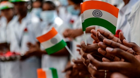 Students from the government college of nursing hold Indian national flags to celebrate the Republic Day, in Chennai. (AP) Students from the government college of nursing hold Indian national flags to celebrate the Republic Day, in Chennai. (AP)