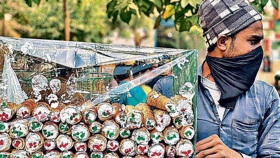 Mr Nadeem is an exuberant man, his enthusiasm is infectious—he laughs a lot, even behind his black handkerchief-mask, and it’s a stage performance each time he serves up a cream roll.(Mayank Austen Soofi) Mr Nadeem is an exuberant man, his enthusiasm is infectious—he laughs a lot, even behind his black handkerchief-mask, and it’s a stage performance each time he serves up a cream roll.(Mayank Austen Soofi)