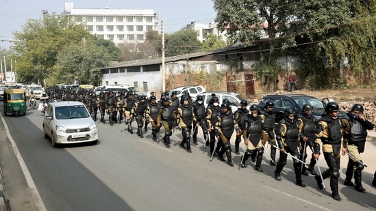 Gurugram: Haryana Police personnel conduct a march near Rajiv Chowk as part of preparations for farmers' tractor rally, in Gurugram, Monday, Jan. 25, 2021. (PTI Photo) (PTI01_25_2021_000228B)(PTI) Gurugram: Haryana Police personnel conduct a march near Rajiv Chowk as part of preparations for farmers' tractor rally, in Gurugram, Monday, Jan. 25, 2021. (PTI Photo) (PTI01_25_2021_000228B)(PTI)