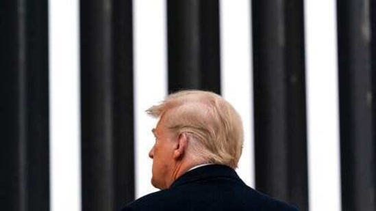 FILE - In this Jan. 12, 2021, file photo, President Donald Trump tours a section of the U.S.-Mexico border wall in Alamo, Texas. During the Trump administration's final weeks, the Department of Homeland Security quietly signed agreements with at least four states that threaten to temporarily derail President Joe Biden's efforts to undo his predecessor's immigration policies. (AP Photo/Alex Brandon, File)(AP) FILE - In this Jan. 12, 2021, file photo, President Donald Trump tours a section of the U.S.-Mexico border wall in Alamo, Texas. During the Trump administration's final weeks, the Department of Homeland Security quietly signed agreements with at least four states that threaten to temporarily derail President Joe Biden's efforts to undo his predecessor's immigration policies. (AP Photo/Alex Brandon, File)(AP)