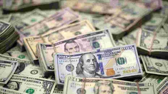 US Dollar banknotes are seen in this photo illustration(Reuters File Photo ) US Dollar banknotes are seen in this photo illustration(Reuters File Photo )