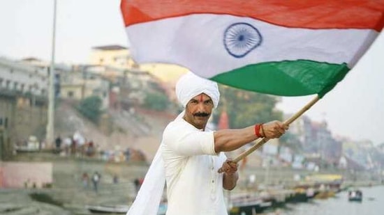 John Abraham holds the national flag in a new pic from Satyameva Jayate 2.(Twitter)