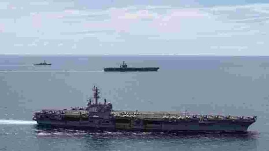 China on Monday complained that the United States frequently sends aircraft and vessels into the South China Sea, through which trillion dollars in trade flow every year, to "flex its muscles" and said such actions are not conducive to peace and stability in the region(AP) China on Monday complained that the United States frequently sends aircraft and vessels into the South China Sea, through which trillion dollars in trade flow every year, to "flex its muscles" and said such actions are not conducive to peace and stability in the region(AP)