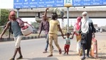 Family members of a migrant labourer on foot walking from Delhi to their native place spotted on Delhi-Kolkata NH 2, during the nationwide Covid-19 lockdown, in Dhanbad. (Chandan Paul/Hindustan Times) Family members of a migrant labourer on foot walking from Delhi to their native place spotted on Delhi-Kolkata NH 2, during the nationwide Covid-19 lockdown, in Dhanbad. (Chandan Paul/Hindustan Times)