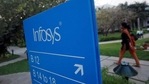 An employee walks past a signage board in the Infosys campus at the Electronics City IT district in Bangalore(Reuters) An employee walks past a signage board in the Infosys campus at the Electronics City IT district in Bangalore(Reuters)