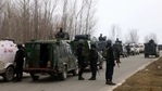 Security personnel stand guard after Improvised Explosive Device (IED) blast near a school in Shamsipora area of South Kashmir's Kulgam district on Wednesday. (ANI Photo) Security personnel stand guard after Improvised Explosive Device (IED) blast near a school in Shamsipora area of South Kashmir's Kulgam district on Wednesday. (ANI Photo)
