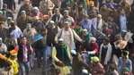 BKU spokesperson Rakesh Tikait with farmers at Ghazipur border ahead of the 'Kisan Gantantra Parade' in protest against Centre's farm reform laws, on the occasion of 72nd Republic Day, in New Delhi.(PTI) BKU spokesperson Rakesh Tikait with farmers at Ghazipur border ahead of the 'Kisan Gantantra Parade' in protest against Centre's farm reform laws, on the occasion of 72nd Republic Day, in New Delhi.(PTI)