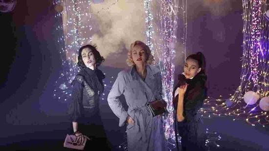Models Angeliki Tsionou, Michaela Tomanova and Sheherazade Dakhlaoui, from left to right, display creations by Julien Fournie for his Haute Couture Spring/Summer 2021 fashion collection for a digital presentation of the fashion week, in Paris, Thursday, Jan. 7, 2021. With shows taking place behind closed doors due to the virus pandemic, some designers such as Julien Fournie are becoming versatile: Getting their designs out to the public by making a film of their collection and streaming it online. (AP)