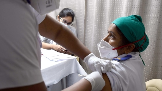 A healthcare worker gets a Covid-19 vaccine at Sion Hospital, in Mumbai on Saturday. (ANI Photo)