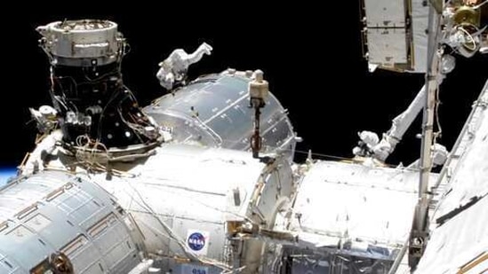 In this image taken from NASA video, NASA astronaut Mike Hopkins works outside the International Space Station’s European lab on Wednesday, Jan. 27, 2021. Hopkins and Victor Glover went spacewalking Wednesday to install a high-speed data link outside the International Space Station’s European lab and connect cables for an experiment platform awaiting activation for almost a year. (NASA via AP)(AP) In this image taken from NASA video, NASA astronaut Mike Hopkins works outside the International Space Station’s European lab on Wednesday, Jan. 27, 2021. Hopkins and Victor Glover went spacewalking Wednesday to install a high-speed data link outside the International Space Station’s European lab and connect cables for an experiment platform awaiting activation for almost a year. (NASA via AP)(AP)