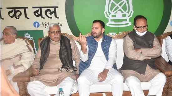 RJD leader Tejashwi Yadav presides over a meeting with party leaders. (File photo) RJD leader Tejashwi Yadav presides over a meeting with party leaders. (File photo)