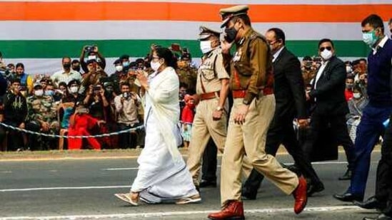 Mamata Banerjee, Chief Minister of eastern Indian state West Bengal greets the audience as she arrives to attend the Republic Day ceremonial parade in Kolkata, India, Tuesday, Jan. 26, 2021. Republic Day marks the anniversary of the adoption of the country's constitution on Jan. 26, 1950. (AP Photo/Bikas Das)(AP) Mamata Banerjee, Chief Minister of eastern Indian state West Bengal greets the audience as she arrives to attend the Republic Day ceremonial parade in Kolkata, India, Tuesday, Jan. 26, 2021. Republic Day marks the anniversary of the adoption of the country's constitution on Jan. 26, 1950. (AP Photo/Bikas Das)(AP)