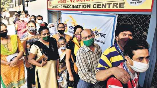 People line-up to get vaccinated at Rajawadi Hospital. (Satish Bate/HT Photo) People line-up to get vaccinated at Rajawadi Hospital. (Satish Bate/HT Photo)