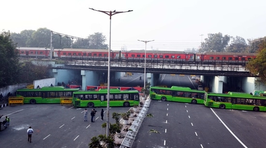 DTC buses blocking the road after being used as barricades during the farmers' rally on Republic Day, at ITO in New Delhi(Arvind Yadav/Hindustan Times) DTC buses blocking the road after being used as barricades during the farmers' rally on Republic Day, at ITO in New Delhi(Arvind Yadav/Hindustan Times)