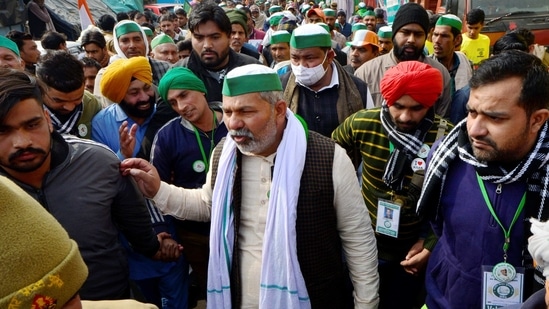 New Delhi: BKU spokesperson Rakesh Tikait along with farmers during their ongoing protest against the new farm laws, at Ghazipur border in New Delhi, Monday, Jan. 25, 2021. (PTI Photo/Ravi Choudhary)(PTI01_25_2021_000121A)(PTI) New Delhi: BKU spokesperson Rakesh Tikait along with farmers during their ongoing protest against the new farm laws, at Ghazipur border in New Delhi, Monday, Jan. 25, 2021. (PTI Photo/Ravi Choudhary)(PTI01_25_2021_000121A)(PTI)