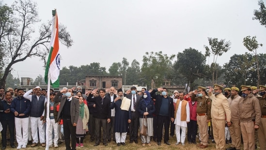 Ayodhya: A flag hoisting ceremony on the occasion of the Republic Day before the symbolic foundation stone laying for the construction of a mosque in the 5 acre land, which has been alloted after the Supreme Court verdict on Ram Janmabhoomi-Babari Masjid case, at Dhannipur, Tuesday, Jan. 26, 2021. (PTI Photo)(PTI01_26_2021_000291B)(PTI) Ayodhya: A flag hoisting ceremony on the occasion of the Republic Day before the symbolic foundation stone laying for the construction of a mosque in the 5 acre land, which has been alloted after the Supreme Court verdict on Ram Janmabhoomi-Babari Masjid case, at Dhannipur, Tuesday, Jan. 26, 2021. (PTI Photo)(PTI01_26_2021_000291B)(PTI)