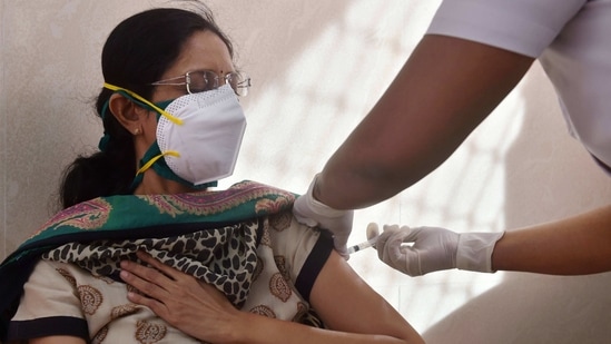 A medic vaccinates a beneficiary with Covaxin vaccine during a countrywide inoculation drive against Covid-19, in Mumbai on Wednesday.(PTI Photo) A medic vaccinates a beneficiary with Covaxin vaccine during a countrywide inoculation drive against Covid-19, in Mumbai on Wednesday.(PTI Photo)