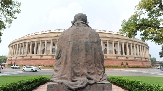 A Mahatma Gandhi statue overlooks the Parliament building as lawmakers prepare for upcoming Budget session. (AP Photo) A Mahatma Gandhi statue overlooks the Parliament building as lawmakers prepare for upcoming Budget session. (AP Photo)