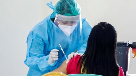If there is reason for optimism, it’s that over the past year, the world has seen the largest public health effort in its history (REUTERS) If there is reason for optimism, it’s that over the past year, the world has seen the largest public health effort in its history (REUTERS)