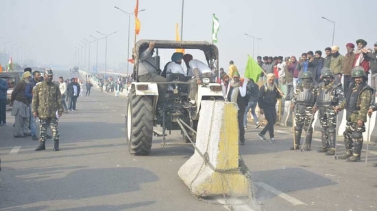 A video of an unruly tractor moving waywardly towards police personnel at ITO emerged on Tuesday as farmers protesting against farm laws deviated from their route and moved inside the Capital.