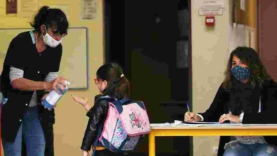 Groups representing US doctors, teachers and top school officials on Friday pushed back against pressure from President Donald Trump to fully reopen US schools, saying science must guide the decisions.(AP) Groups representing US doctors, teachers and top school officials on Friday pushed back against pressure from President Donald Trump to fully reopen US schools, saying science must guide the decisions.(AP)