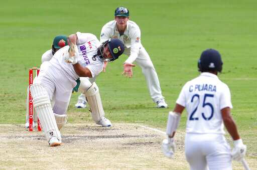 Indias Rishabh Pant hits the ball for six runs during play on the final day of the fourth cricket test between India and Australia at the Gabba, Brisbane, Australia.(AP) Indias Rishabh Pant hits the ball for six runs during play on the final day of the fourth cricket test between India and Australia at the Gabba, Brisbane, Australia.(AP)