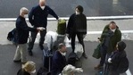 Members of a WHO team arrives in Wuhan in central China's Hubei province on Thursday, Jan. 14, 2021. The global team of researchers arrived Thursday in the Chinese city where the coronavirus pandemic was first detected to conduct a politically sensitive investigation into its origins amid uncertainty about whether Beijing might try to prevent embarrassing discoveries. (AP Photo/Ng Han Guan)(AP) Members of a WHO team arrives in Wuhan in central China's Hubei province on Thursday, Jan. 14, 2021. The global team of researchers arrived Thursday in the Chinese city where the coronavirus pandemic was first detected to conduct a politically sensitive investigation into its origins amid uncertainty about whether Beijing might try to prevent embarrassing discoveries. (AP Photo/Ng Han Guan)(AP)