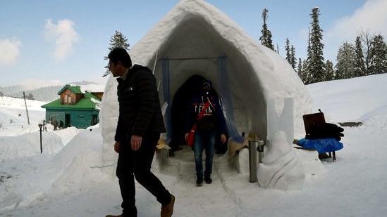 Tourists come out from the first Igloo Cafe at Gulmarg near Srinagar.(ANI)