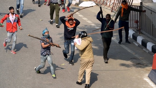 It said some of the protesters, who deviated from the route agreed upon with the police and stormed the historic monument, were armed with pistols as well as swords, spears, sickles, sticks and rods. (Arvind Yadav/Hindustan Times) It said some of the protesters, who deviated from the route agreed upon with the police and stormed the historic monument, were armed with pistols as well as swords, spears, sickles, sticks and rods. (Arvind Yadav/Hindustan Times)