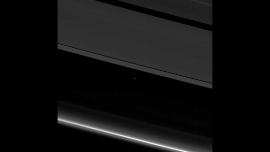 See that white dot? That’s us, Earth, shown from the Cassini spacecraft that flew past Saturn’s icy rings in 2017. Cassini was 870 million miles (1.4 billion kilometers) away from Earth when the image was taken.(Photo by NASA/JPL-Caltech/Space Science Institute)
