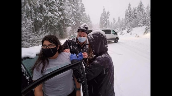 The image shows officials of medical team administering vaccine.(Facebook/@JosephineCountyPublicHealth)