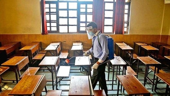 A classroom at Mount Abu School in Rohini being sanitised, a day before schools in Delhi resume in-person sessions for students of classes 10 and 12.( anchit Khanna/HT PHOTO) A classroom at Mount Abu School in Rohini being sanitised, a day before schools in Delhi resume in-person sessions for students of classes 10 and 12.( anchit Khanna/HT PHOTO)
