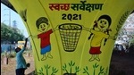 An artist gives finishing touches to indicate Swachh Survekshan 2021 and create awareness of keeping the city clean. (Praful Gangurde/HT photo) An artist gives finishing touches to indicate Swachh Survekshan 2021 and create awareness of keeping the city clean. (Praful Gangurde/HT photo)