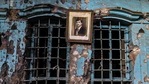 A portrait of an Iraqi man hangs on the wall of a heavily damaged house in the Old City of Mosul on January 26, 2021. Once the historic heart of Iraq's Mosul, the Old City has lain in ruins for years. A portrait of an Iraqi man hangs on the wall of a heavily damaged house in the Old City of Mosul on January 26, 2021. Once the historic heart of Iraq's Mosul, the Old City has lain in ruins for years.