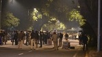 Police gather at a street after an explosion near the Israeli embassy in New Delhi.(AFP) Police gather at a street after an explosion near the Israeli embassy in New Delhi.(AFP)