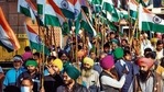Farmers march with the national flag during the tiranga rally at Tikri border on Thursday. (ANI) Farmers march with the national flag during the tiranga rally at Tikri border on Thursday. (ANI)