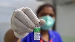 A medic shows a vial of Covid vaccine as she prepares to administer it to a medical student during the first inoculation drive, in Bengaluru.(PTI) A medic shows a vial of Covid vaccine as she prepares to administer it to a medical student during the first inoculation drive, in Bengaluru.(PTI)