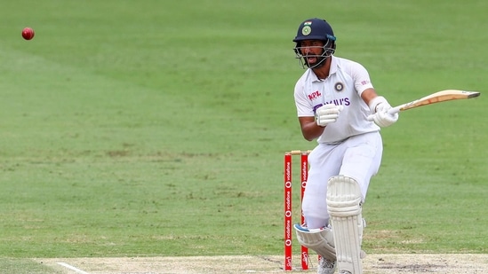 India's Cheteshwar Pujara reacts as he bats during play on the final day of the fourth cricket test between India and Australia at the Gabba, Brisbane.(AP) India's Cheteshwar Pujara reacts as he bats during play on the final day of the fourth cricket test between India and Australia at the Gabba, Brisbane.(AP)
