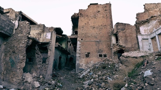 A picture shows destroyed buildings in Mosul on January 18. The single-family homes along the banks of the river Tigris, which divides Mosul in two, have remained largely untouched since Iraqi troops ousted the Islamic State group from the northern city in the summer of 2017, reported AFP.(Zaid AL-Obeidi / AFP)
