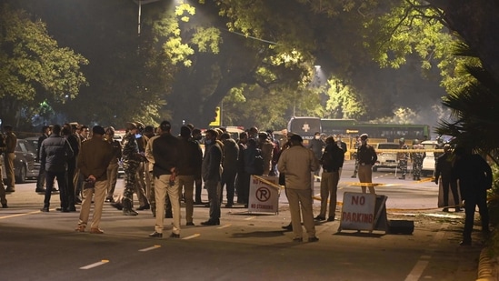 Police gather at a street after an explosion near the Israeli embassy in New Delhi.(AFP)