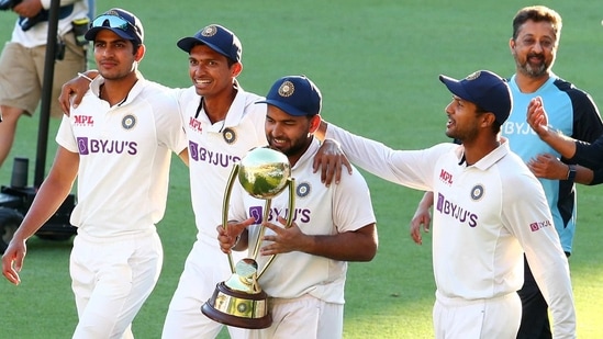 Brisbane: India's Rishabh Pant carries the trophy as he celebrates with his teammates after defeating Australia by three wickets on the final day of the fourth cricket test at the Gabba, Brisbane,(AP) Brisbane: India's Rishabh Pant carries the trophy as he celebrates with his teammates after defeating Australia by three wickets on the final day of the fourth cricket test at the Gabba, Brisbane,(AP)