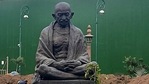 New Delhi: Statue of Mahatma Gandhi relocated in between Gate No 2 and 3 of Parliament House for the ongoing construction of the new Parliament building, in New Delhi, Tuesday, Jan. 19, 2021. (PTI Photo)(PTI01_20_2021_000192A)(PTI) New Delhi: Statue of Mahatma Gandhi relocated in between Gate No 2 and 3 of Parliament House for the ongoing construction of the new Parliament building, in New Delhi, Tuesday, Jan. 19, 2021. (PTI Photo)(PTI01_20_2021_000192A)(PTI)