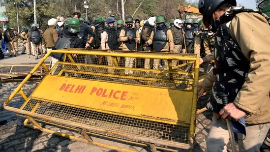 Security personnel at Singhu border during a farmers protest against farm law, in New Delhi on Friday. (ANI Photo)