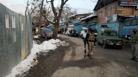 Army jawans stand guard near encounter site in Tral South Kashmir on Friday. (ANI Photo) Army jawans stand guard near encounter site in Tral South Kashmir on Friday. (ANI Photo)