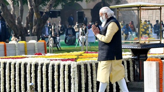 Prime Minister Narendra Modi performing parikrama at the Samadhi of Mahatma Gandhi, on the occasion of Martyrs Day, at Rajghat, in Delhi on Saturday. (ANI Photo)