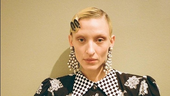 Model in Erdem statement pearl earrings (Instagram)