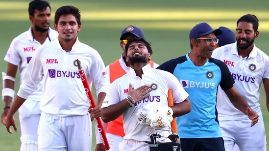 Kartik Tyagi in background as India celebrate Gabba win. (Reuters) Kartik Tyagi in background as India celebrate Gabba win. (Reuters)